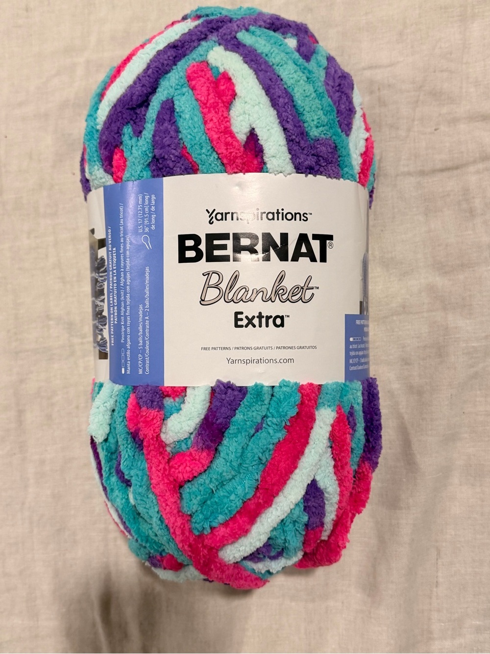 Bernat Blanket Extra Plush Yarn in unicorn lights ( Teal, Purple & Pink )